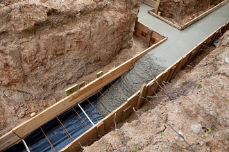 Строительство ленточного фундамента водонепроницаемым бетоном марки М300 класса В22,5